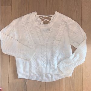 Tilly’s white sweater with criss cross back